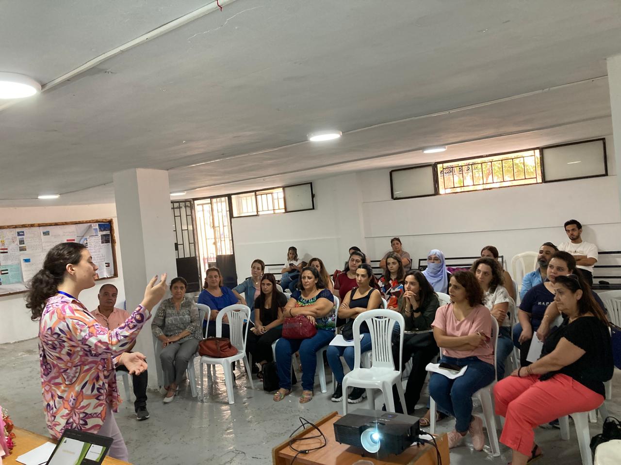 A picture of teachers being trained